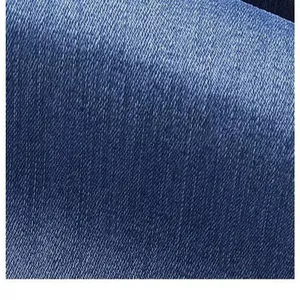 Detailed close-up showing the high-quality texture and blue denim fabric of men's jeans.