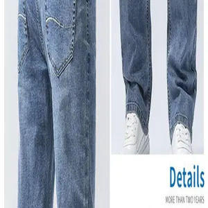 Close-up detail of men's loose straight denim jeans with heart-shaped pocket stitching