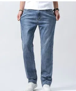 Front view of men's loose straight-leg denim jeans in a classic light blue wash