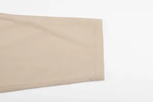Detailed close-up showing the fine corduroy texture and clean hem of men's khaki suit