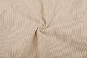 Close-up detail of beige ribbed corduroy fabric for men's summer casual suit set.