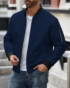 Close-up detail of the dark blue waffle-knit fabric on a men's stand collar zip-up jacket