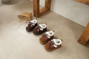 Cute girls cherry snow boots in brown and tan with warm faux fur lining details.