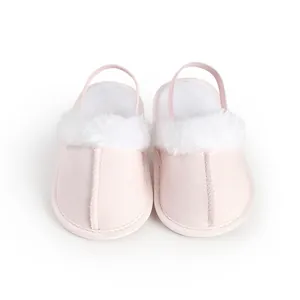 Zapatillas rosas para bebé con ribete de piel sintética blanca y tira trasera