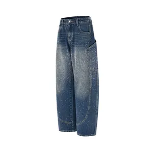 Vintage Amerikaanse stijl blauwe wide-leg jeans met sterren strass en gebogen pijpen.