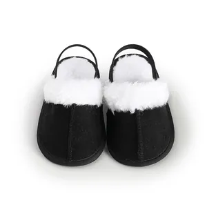 Zapatillas de bebé negras con forro de pelo blanco suave y correas traseras elásticas
