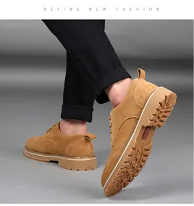 Detailed view of men's tan suede casual shoes with thick anti-slip gum soles.