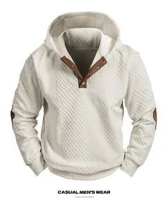 Detailed shot of men's off-white textured jacquard hoodie with button neck