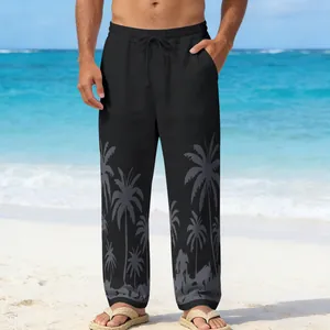 Close-up of the palm tree print on the hem of these men's casual black trousers