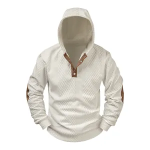 Men's premium cream jacquard knit hoodie featuring buttoned neck and elbow patches