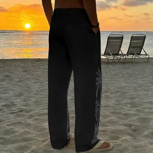 Back view detail of men's casual black beach trousers featuring a grey palm tree print