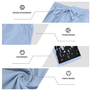 Detail view of men's casual printed beach pants showing waistband, pockets, and fabric