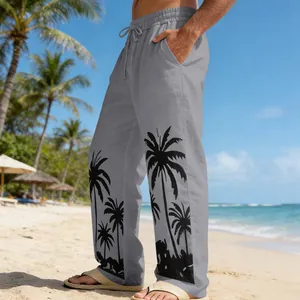 Men's casual grey beach trousers featuring black palm tree prints and drawstring waist