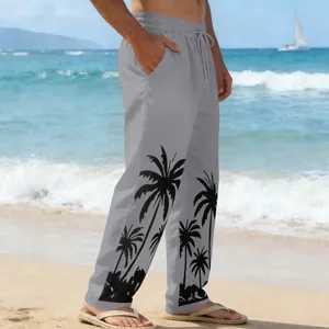 Side view of grey men's casual beach trousers featuring a black palm tree print design