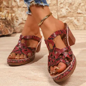 Fashionable red and black snakeskin print block heel sandals with platform soles