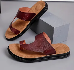 Detailed view of men's dark red PU leather toe-ring sandals with non-slip sole.