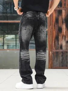 Back view of heavy washed black straight-leg denim jeans for men in urban setting