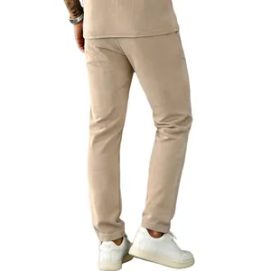 Rear view of men's beige thin corduroy straight-leg casual trousers with rib texture
