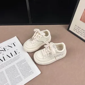 Children's white sneakers with star motif and casual lace-up design in off-white