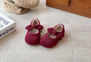 Plush wine red baby shoes with cute bow detail and soft sole for winter comfort
