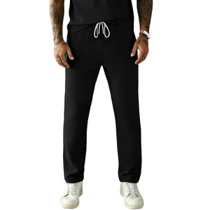 Detail of men's black corduroy casual trousers with adjustable white drawstring