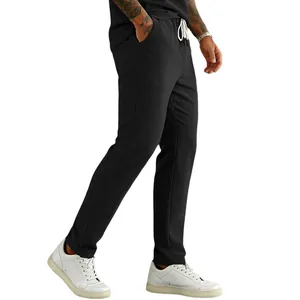 Close-up of black corduroy drawstring pants for men with a straight leg fit