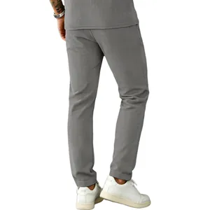 Rear view detail of men's grey corduroy casual pants, straight-leg style leisure wear