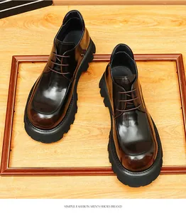 Vintage burnished men's glossy leather boots with chunky platform sole and British style