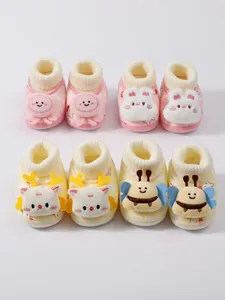 Soft plush winter baby shoes featuring cute animal designs for extra warmth and comfort