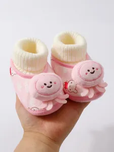 Warm pink plush baby shoes featuring cute cartoon octopus detail for infants 0-12 months