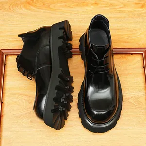 Professional black glossy leather men's dress shoes with stylish thick lug soles