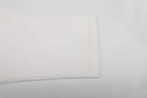 Close-up of the hem on white American corduroy men's casual straight pants.