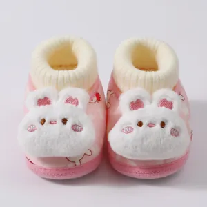 Warm pink winter baby shoes with cute plush rabbit design and fleece lining for newborns