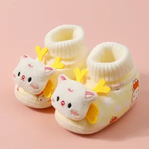 Soft warm yellow baby winter booties with cute plush cat face and antlers for 0-12 months