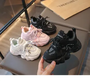 Fashionable mesh sneakers for girls in black, pink, and white with chunky soles.