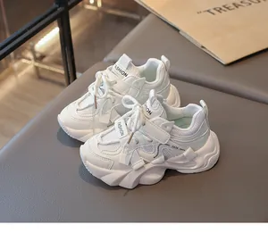 Side view detail of white breathable mesh sports shoes for girls and children