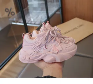 Close-up view of pink girls' fashion sneakers featuring breathable mesh and 2026 design