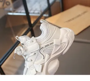 Detailed macro view of white breathable mesh and textures on girls' fashionable sports shoes
