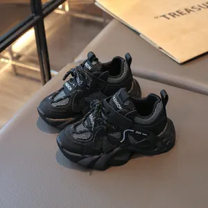 Fashionable black mesh girls' sports shoes with chunky soles and white polka dot accents
