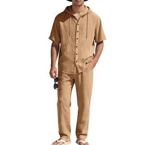 Full view of men's loose linen hooded short sleeve shirt and trouser set in khaki