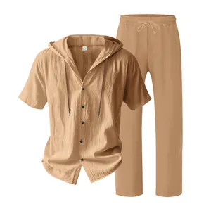 Detailed view of khaki linen men's hooded short sleeve shirt and long pants set.