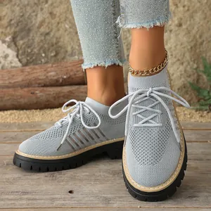 Stylish grey breathable mesh platform sneakers for women with front lace-up design