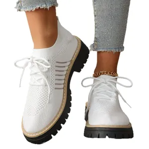 Stylish white knit platform sneakers for women with breathable mesh and lace-up design