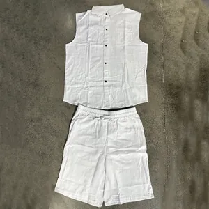 Men's white linen summer set featuring a sleeveless shirt and matching drawstring shorts