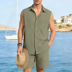 Detailed view of men's olive linen sleeveless shirt and shorts set on a beach