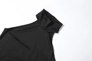 Detailed macro view of black high neck halter bodysuit with soft fabric texture.