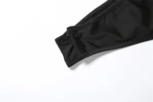Close-up of black halter strap showing durable stitching and high-quality fabric