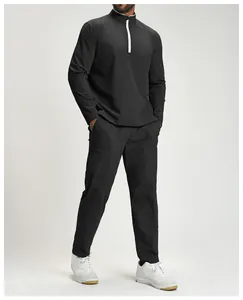 Full view of men's black quick-dry athletic zip-up jacket and matching joggers set