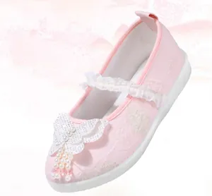 Delicate pink girls Hanfu embroidered cloth shoes with pearl butterfly lace strap detail.