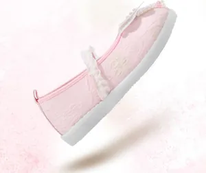 Detailed side view of pink Hanfu embroidered cloth shoe with pearls and lace trim